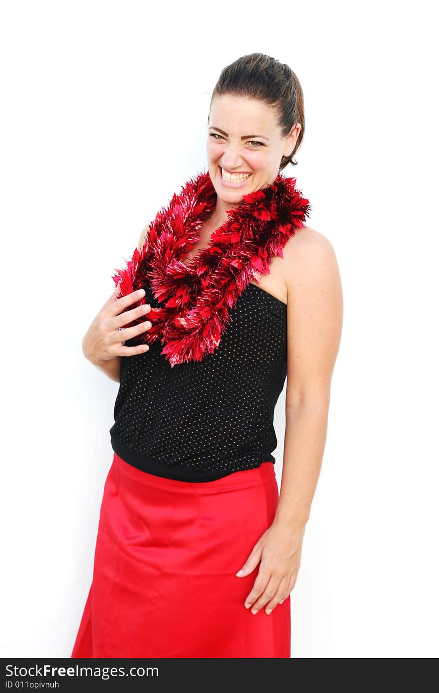 Portrait of a beautiful young brunette woman with tinsel for Christmas - isolated. Portrait of a beautiful young brunette woman with tinsel for Christmas - isolated.