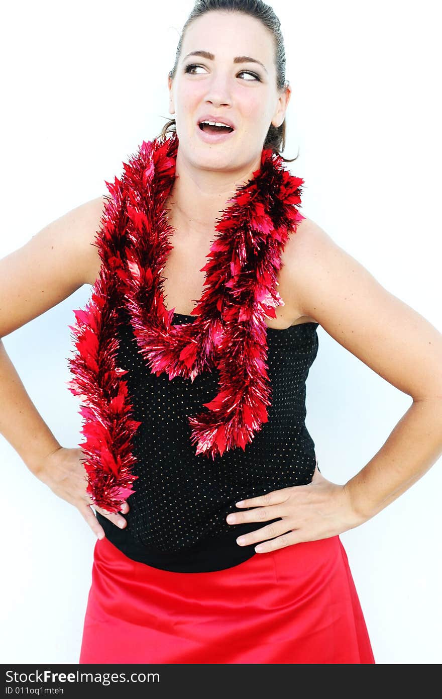 Portrait of a beautiful young brunette woman with tinsel for Christmas - isolated. Portrait of a beautiful young brunette woman with tinsel for Christmas - isolated.