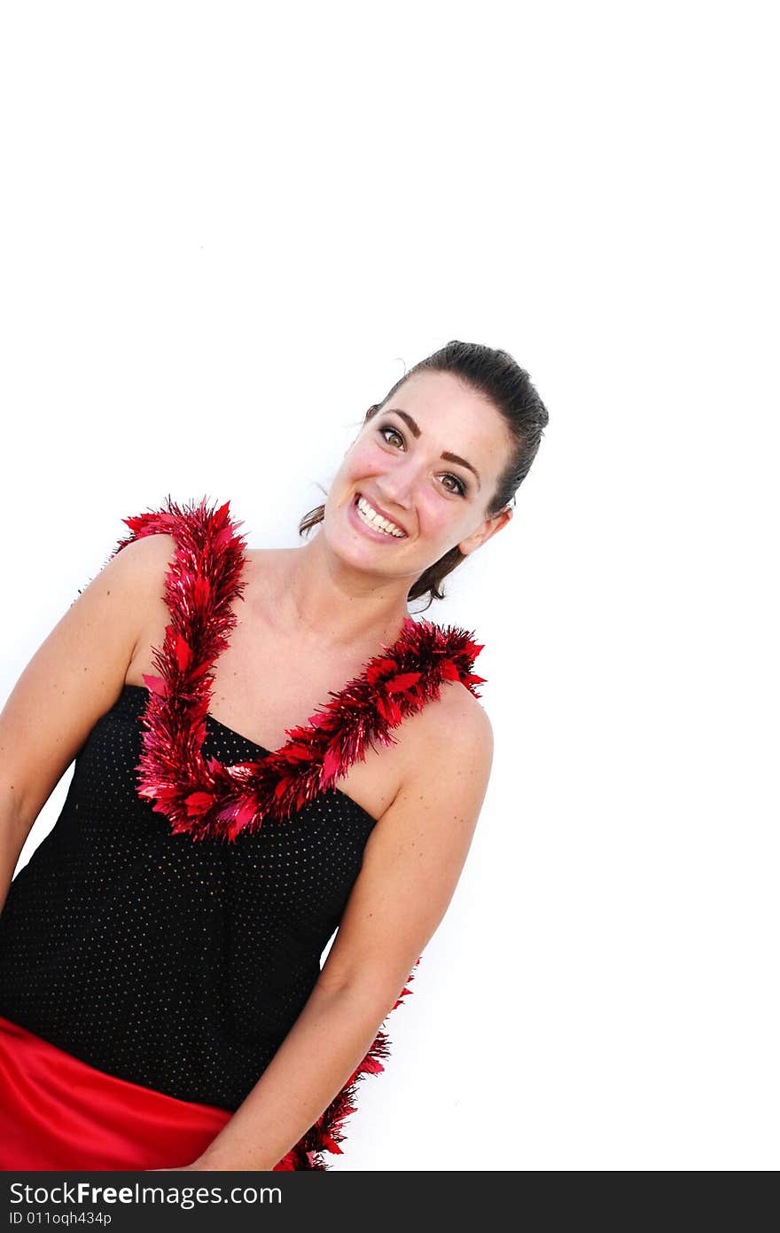 Gorgeous young woman in a Christmas outfit. Gorgeous young woman in a Christmas outfit.