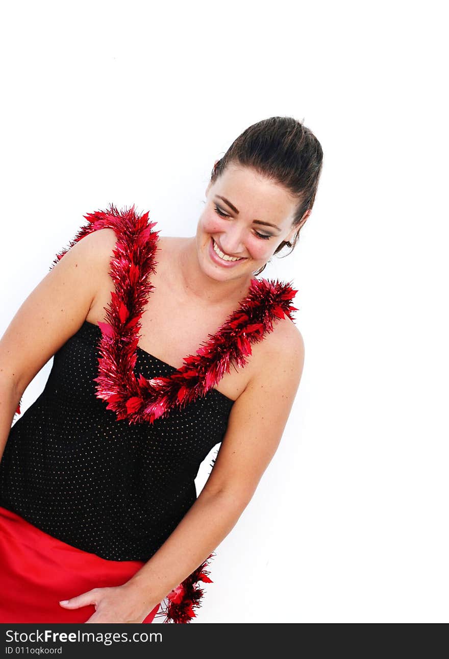 Portrait of a beautiful young brunette woman with tinsel for Christmas. Portrait of a beautiful young brunette woman with tinsel for Christmas.