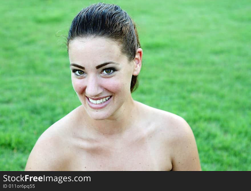 Portrait of a happy young brunette woman.