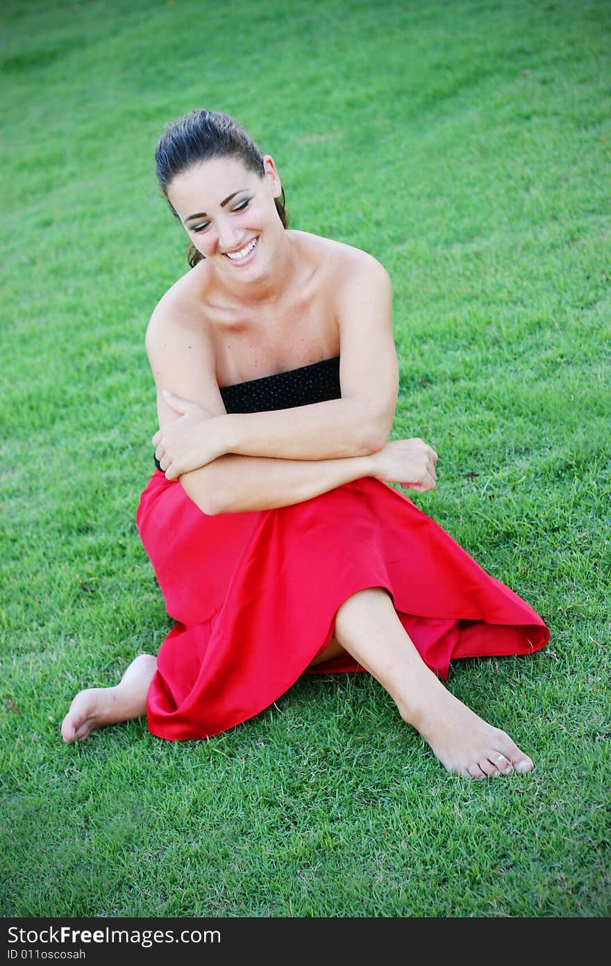 Portrait of a gorgeous woman on the lawn.