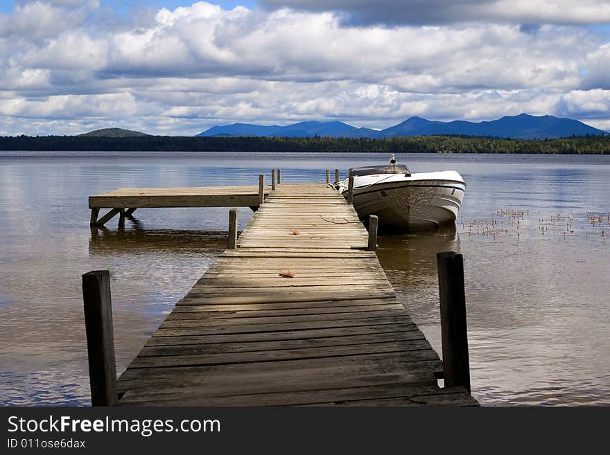 A peaceful lake and a boat in Canada. A peaceful lake and a boat in Canada