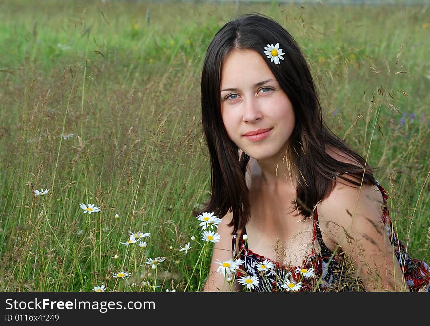 Portrait of the young beautiful woman on the nature. Portrait of the young beautiful woman on the nature