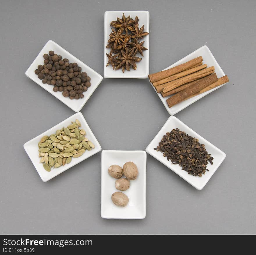 Set of spices: cinnamon, carnation, cardamom, a nutmeg, fragrant pepper, truestar-anisetree. Set of spices: cinnamon, carnation, cardamom, a nutmeg, fragrant pepper, truestar-anisetree