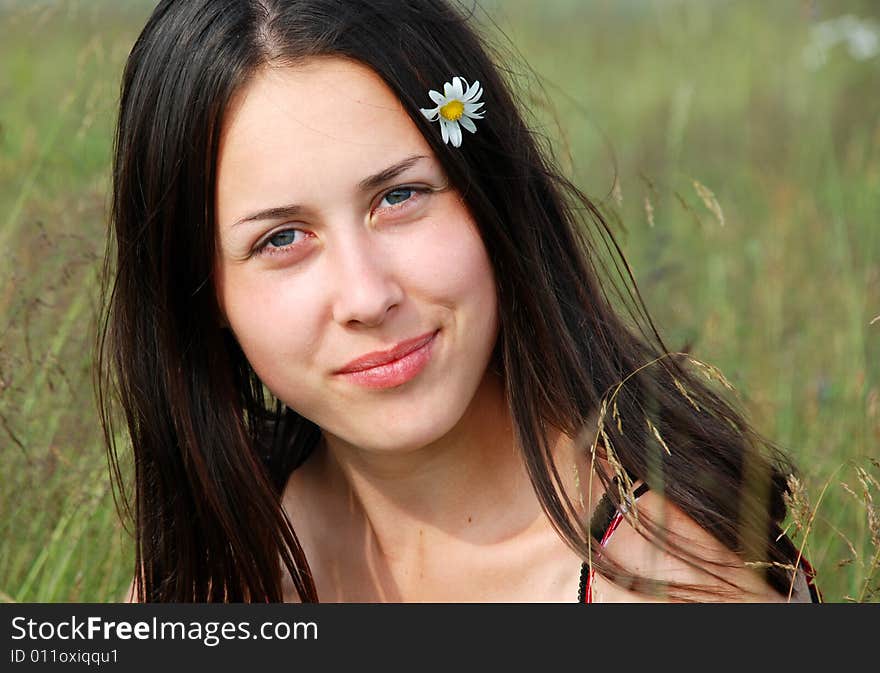 Portrait of the young beautiful woman on the nature. Portrait of the young beautiful woman on the nature