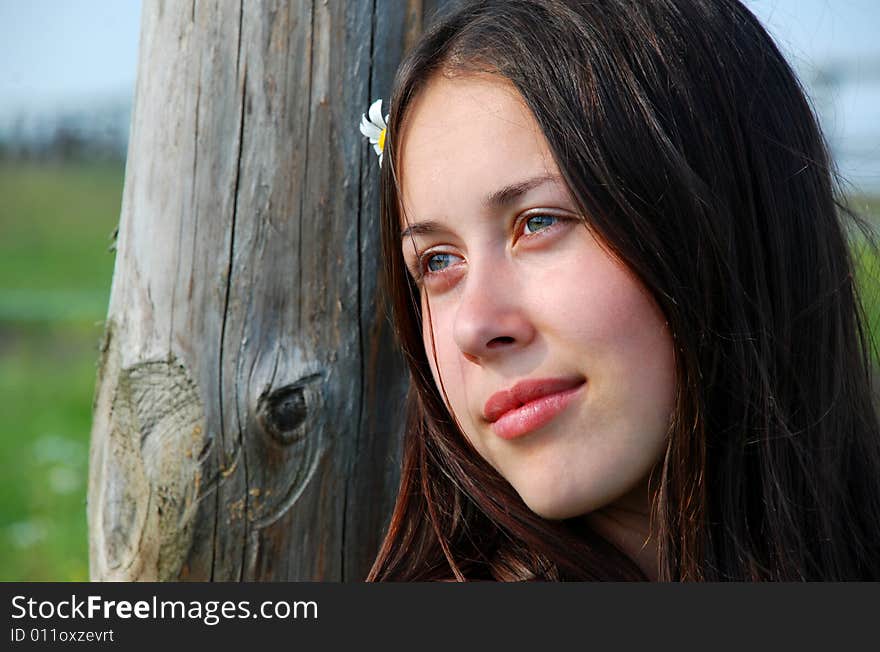 Portrait of the young beautiful woman on the nature. Portrait of the young beautiful woman on the nature