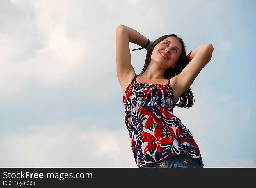 Woman on a background of the sky