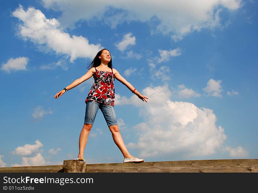 Woman on a background of the sky