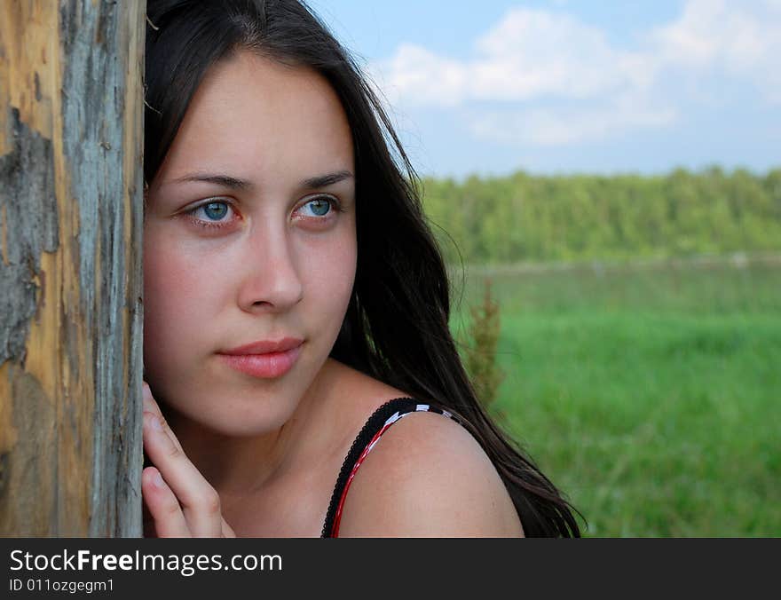 Portrait of the young beautiful woman on the nature. Portrait of the young beautiful woman on the nature