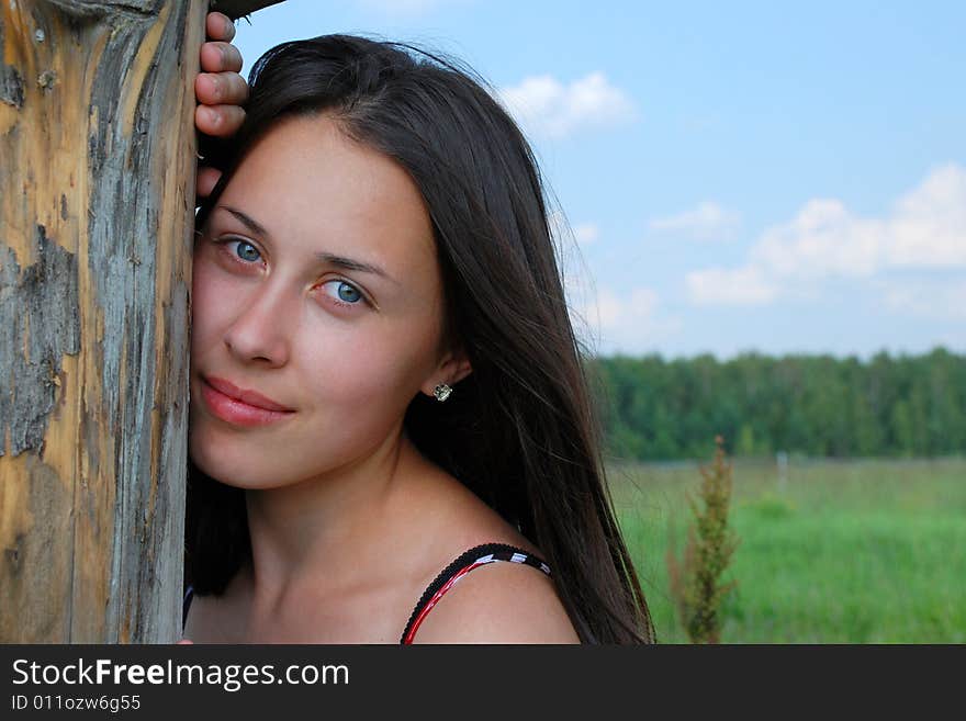 Portrait of the young beautiful woman on the nature. Portrait of the young beautiful woman on the nature