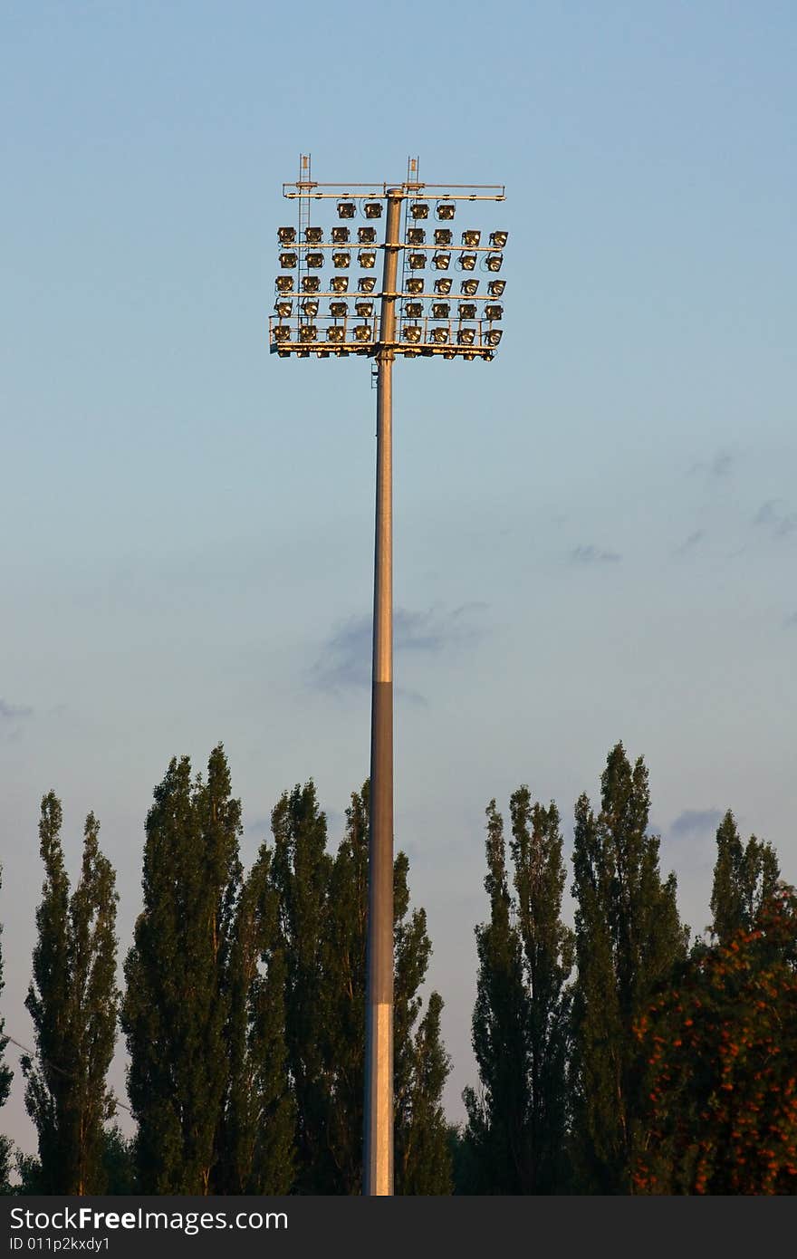 Stadium lights before the sunset