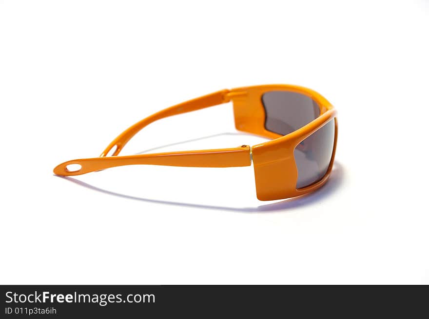 Orange sunglasses isolated on a white background