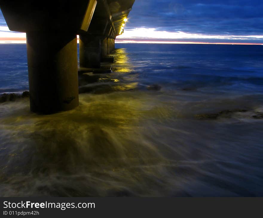 Low light photo of a bridge at sunrise