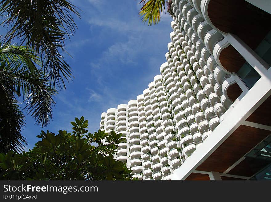 Building and palm trees in resort