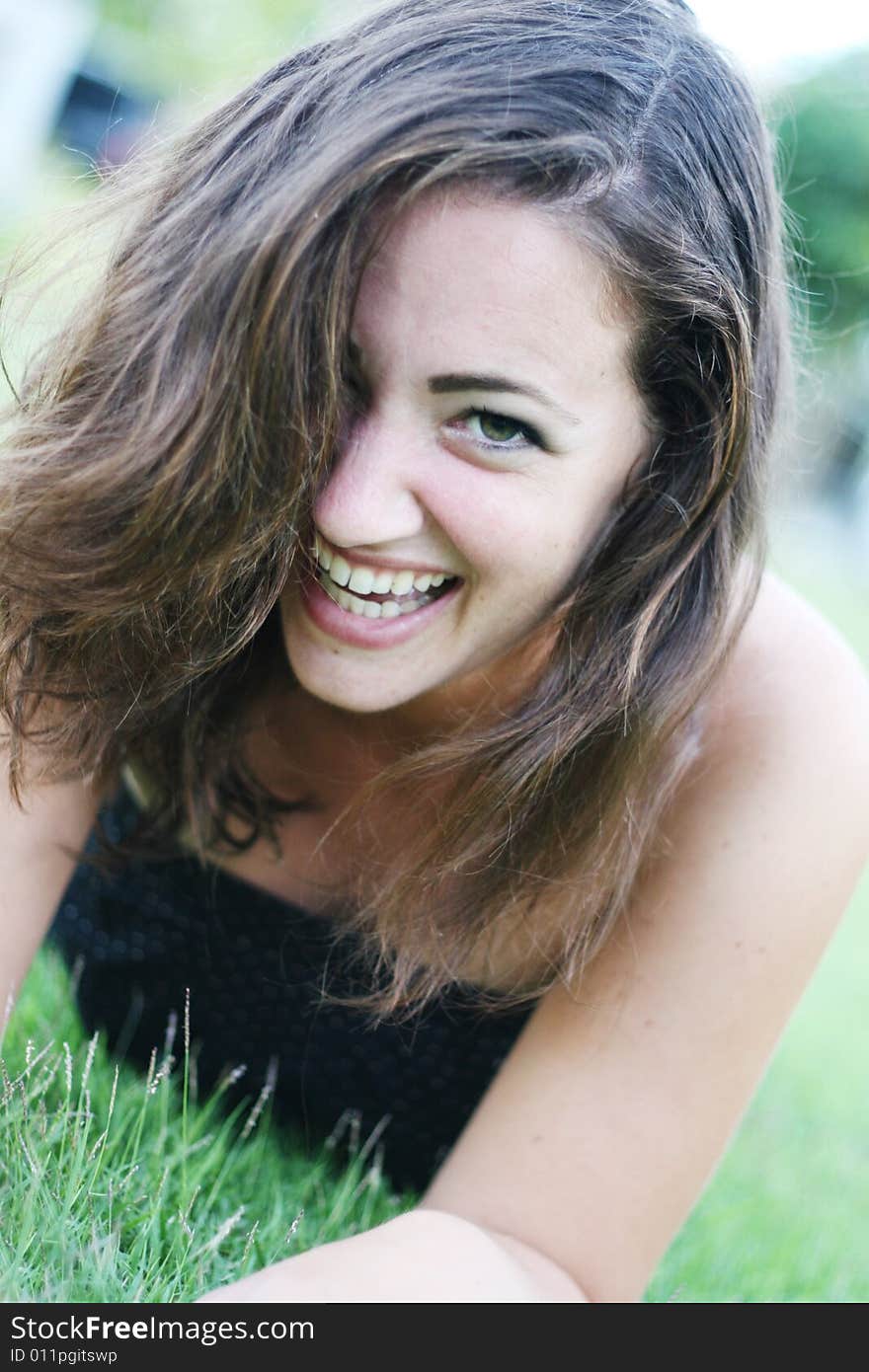 Portrait of a woman with a happy expression.