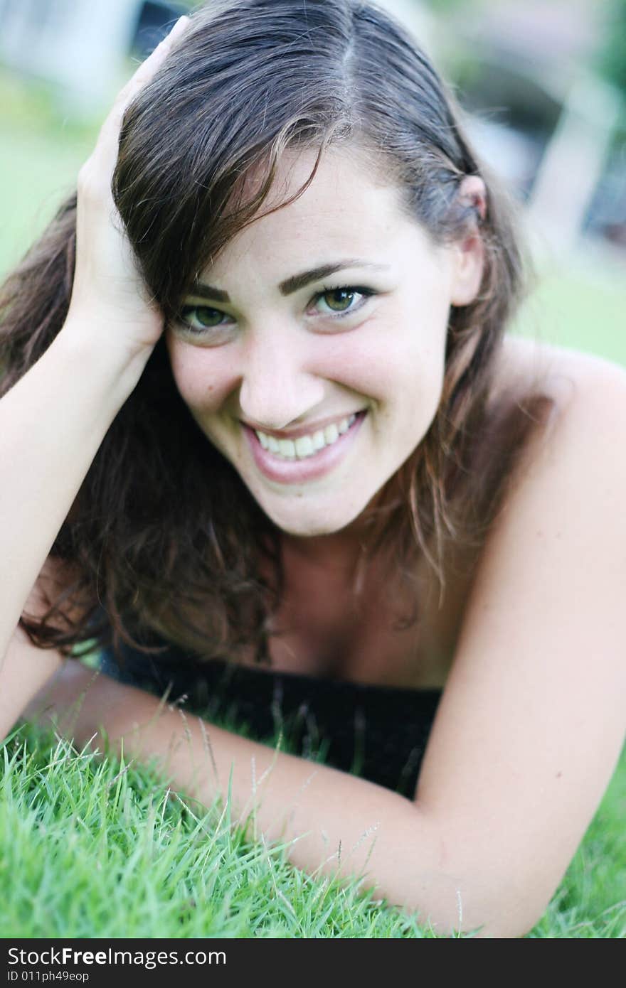 Portrait of a beautiful young woman smiling. Portrait of a beautiful young woman smiling.