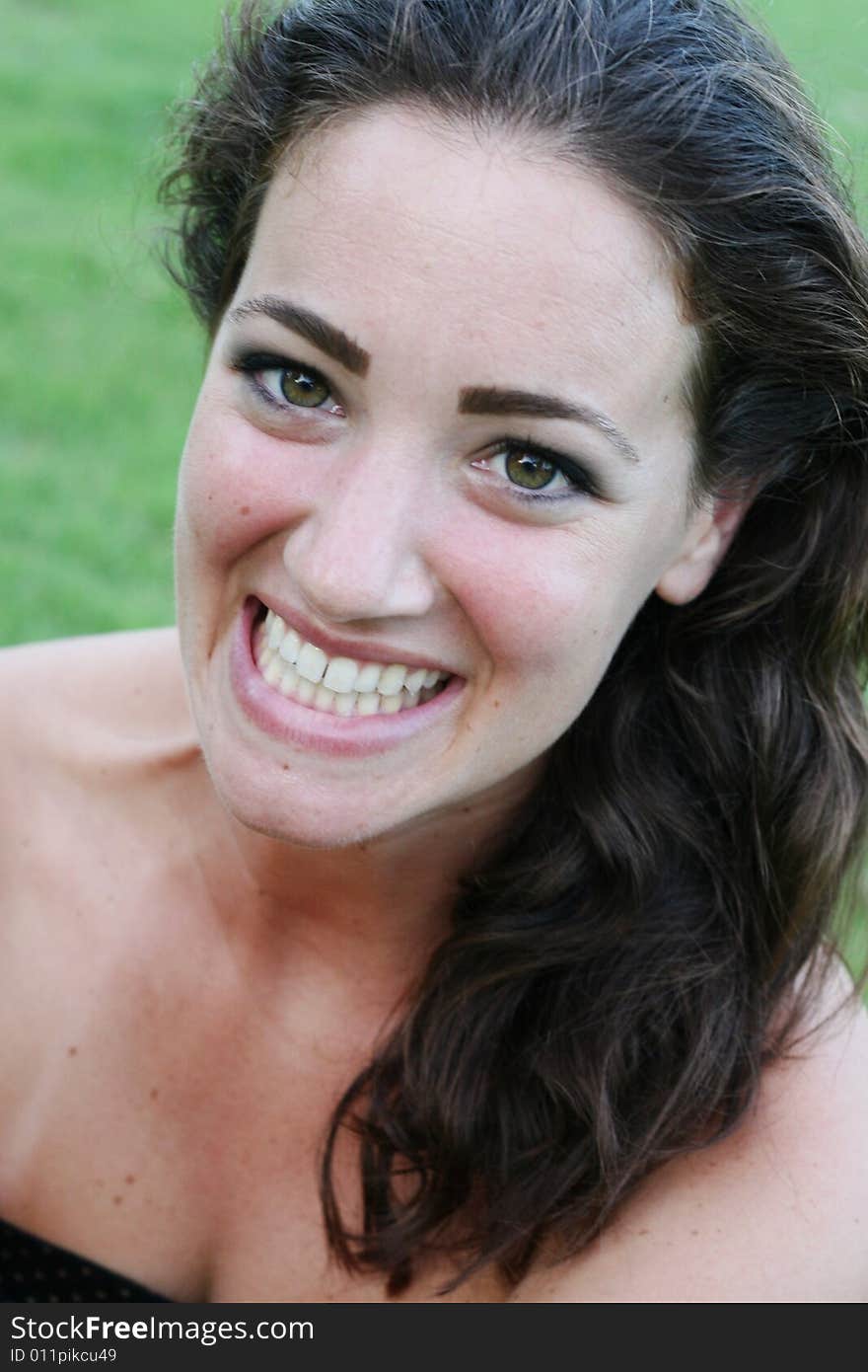 Portrait of a beautiful young woman smiling. Portrait of a beautiful young woman smiling.