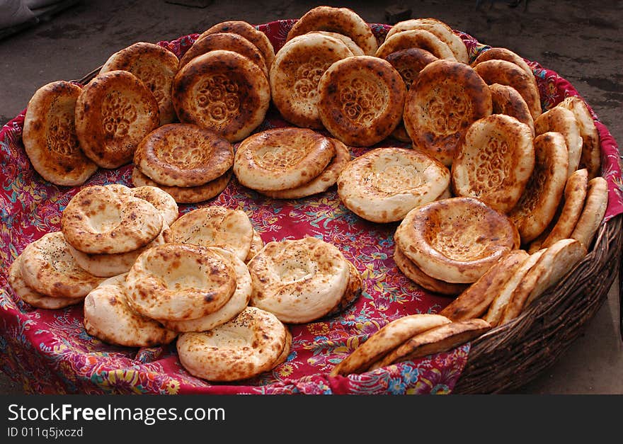 Roasted round cake on the wattled dish. Roasted round cake on the wattled dish