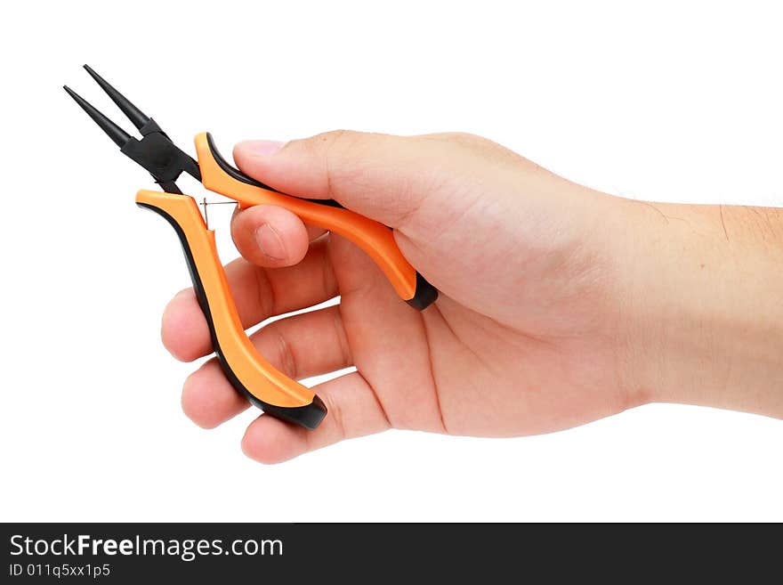 Man's hand holding a craft/jewelry plier over white background. Man's hand holding a craft/jewelry plier over white background.