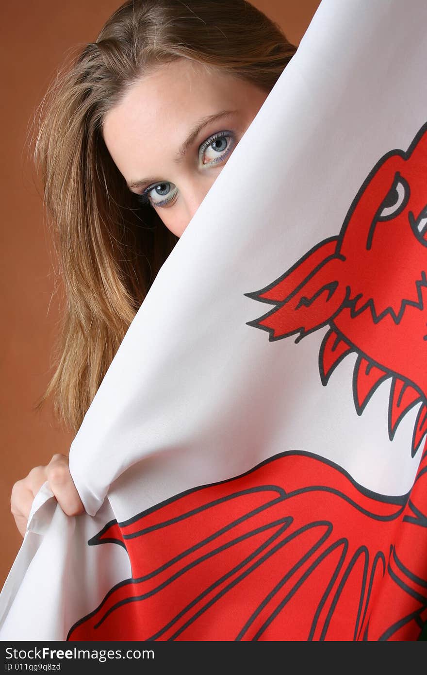 Beautiful young female model with a Welsh Flag. Beautiful young female model with a Welsh Flag