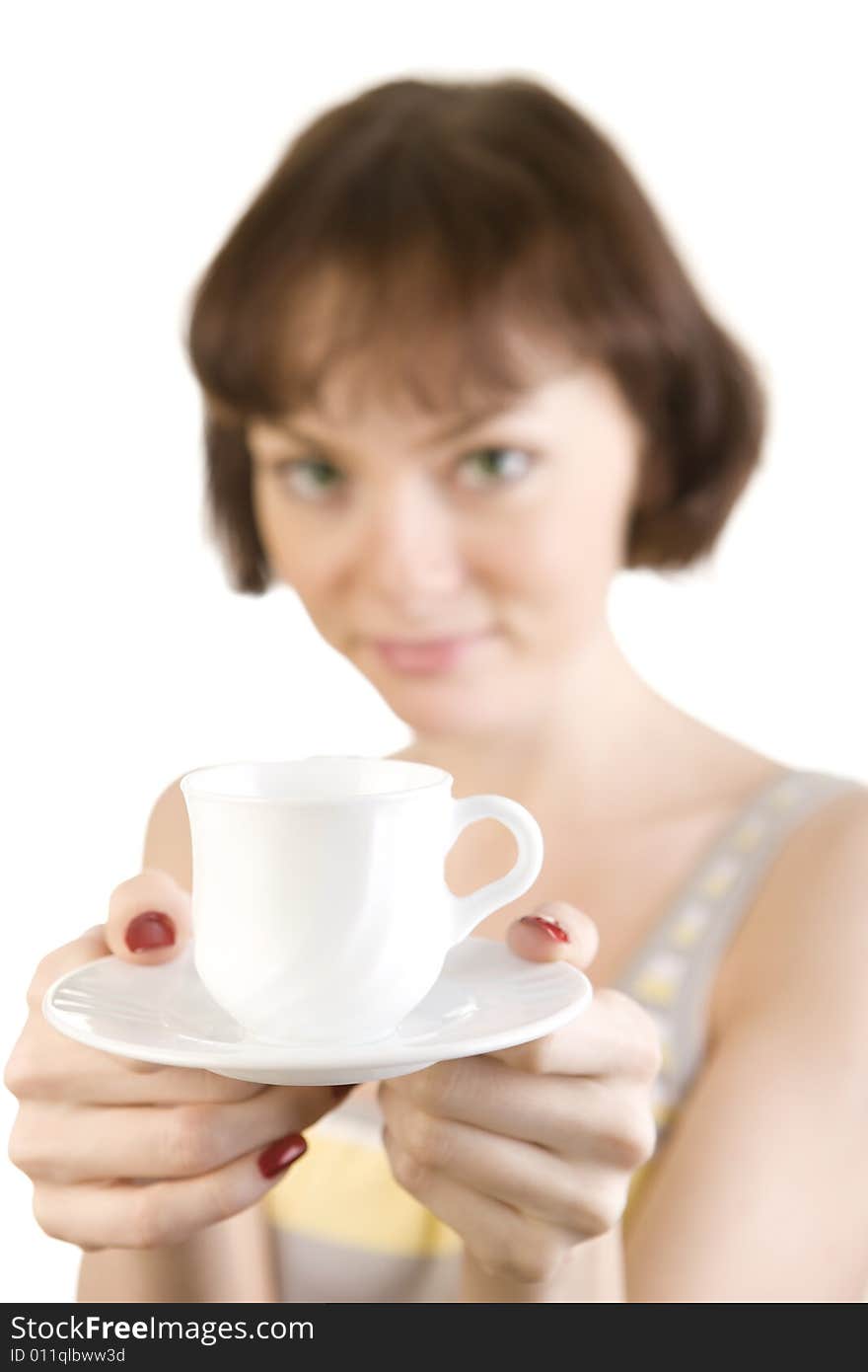 A photo of beautiful woman offering a cup of coffee. A photo of beautiful woman offering a cup of coffee