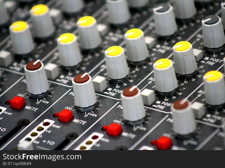 Detail of a mixer used in audio engineering