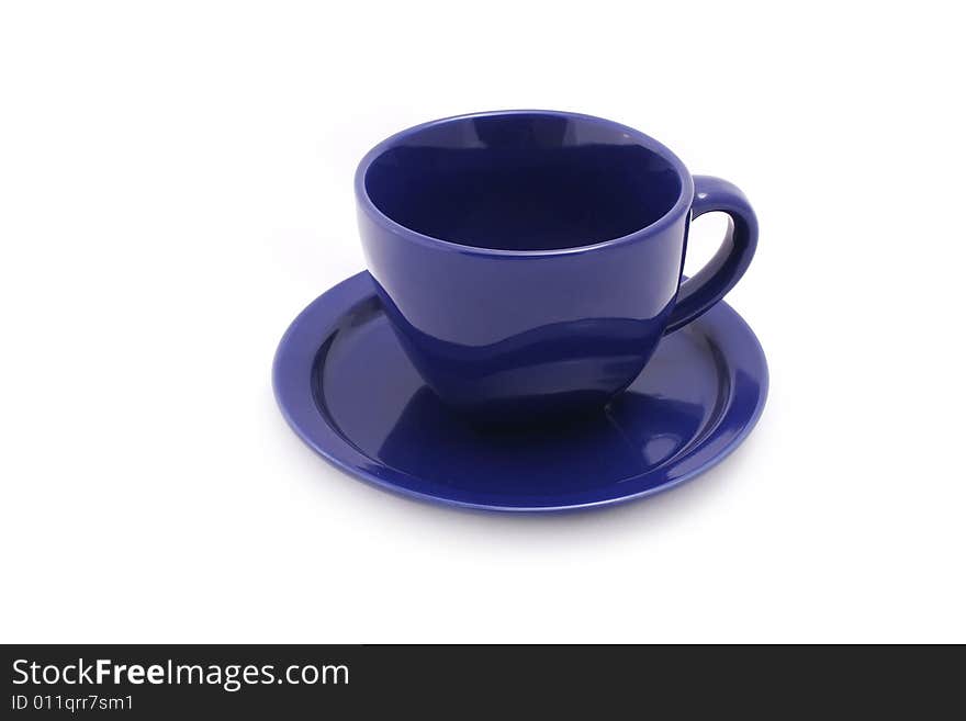 Cup and saucer on white background