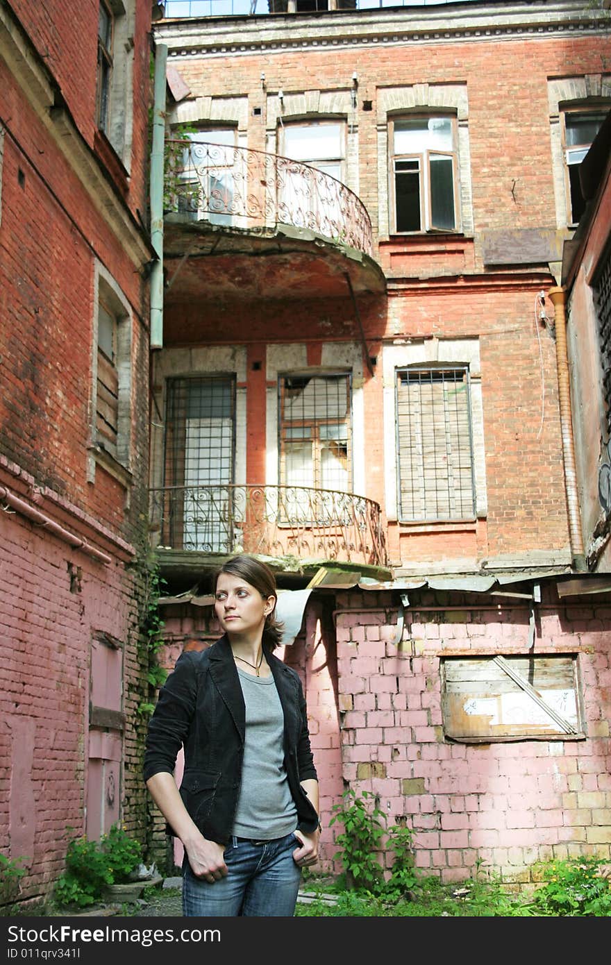 Woman on the old architecture background