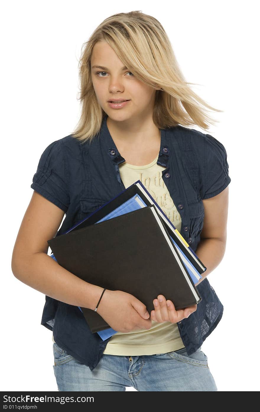 Teenager keeping in hands three books