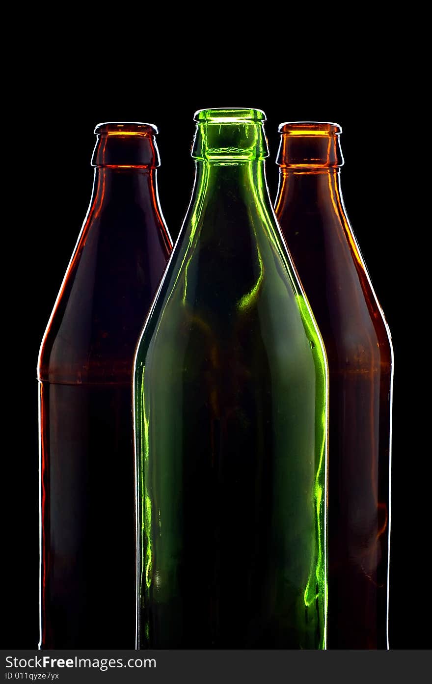 Close-up empty bottles isolated on black