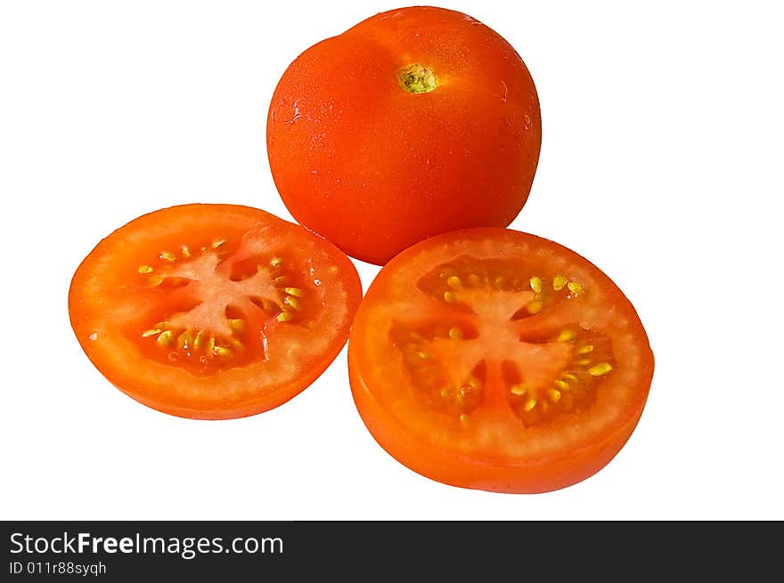 A tomato and two halves isolted on a white background  with clipping path. A tomato and two halves isolted on a white background  with clipping path