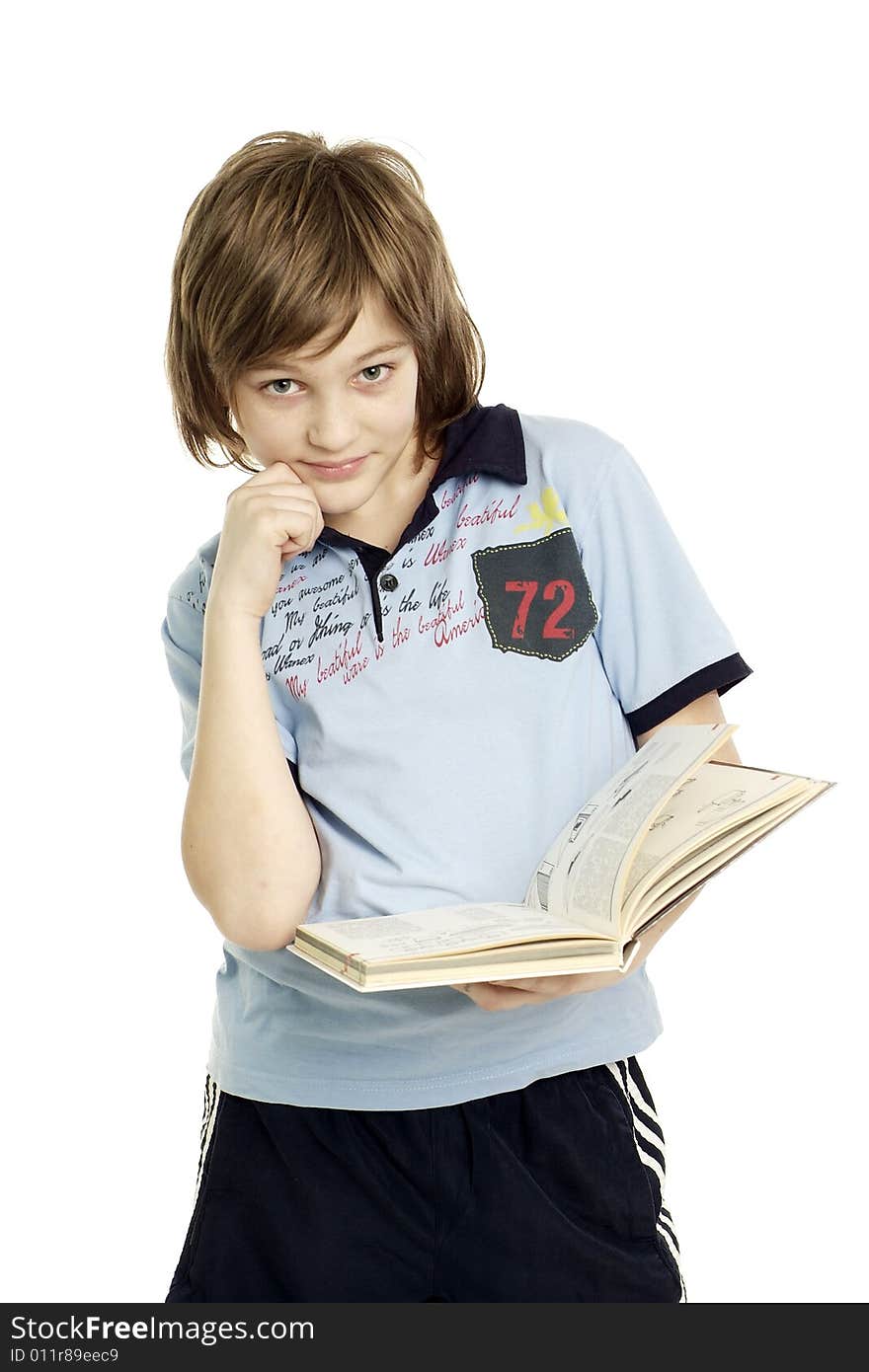 Young boy with book on white background. Young boy with book on white background