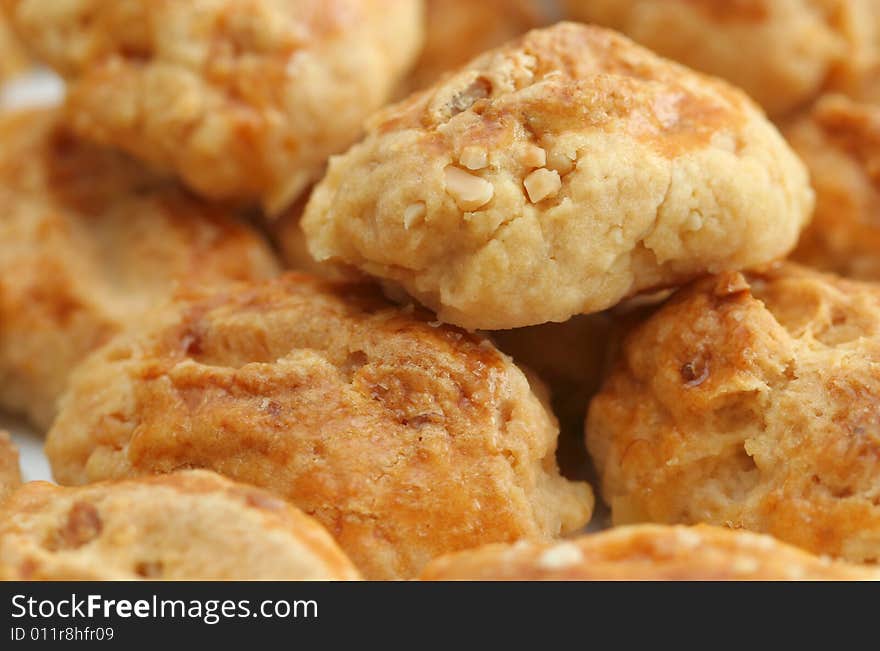 Close-up of crisp almond buns, shallow dof.