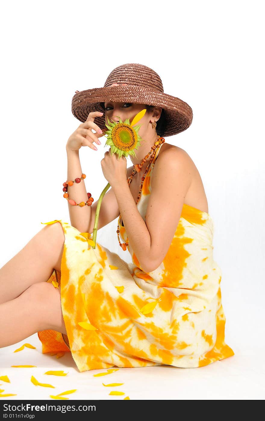 Portrait of fresh female holding sunflower with last petal - isolated. Portrait of fresh female holding sunflower with last petal - isolated