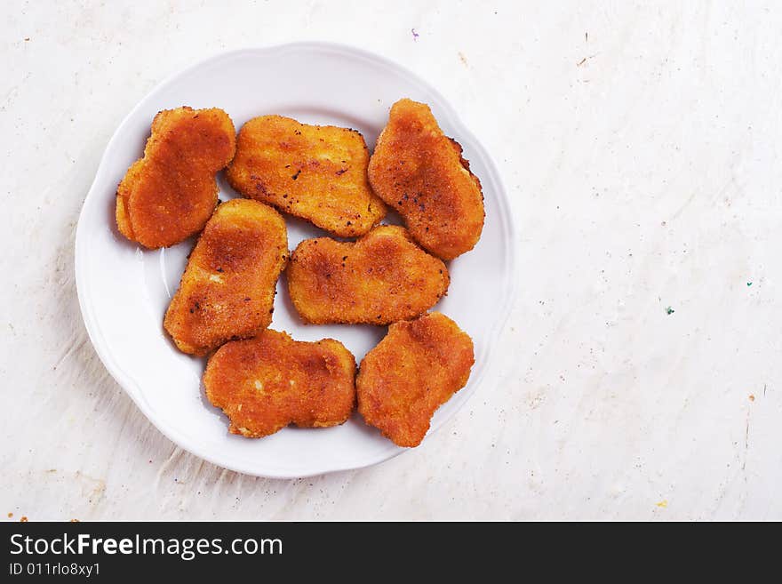 Hot and fresh chicken cutlets on the plate. Hot and fresh chicken cutlets on the plate.