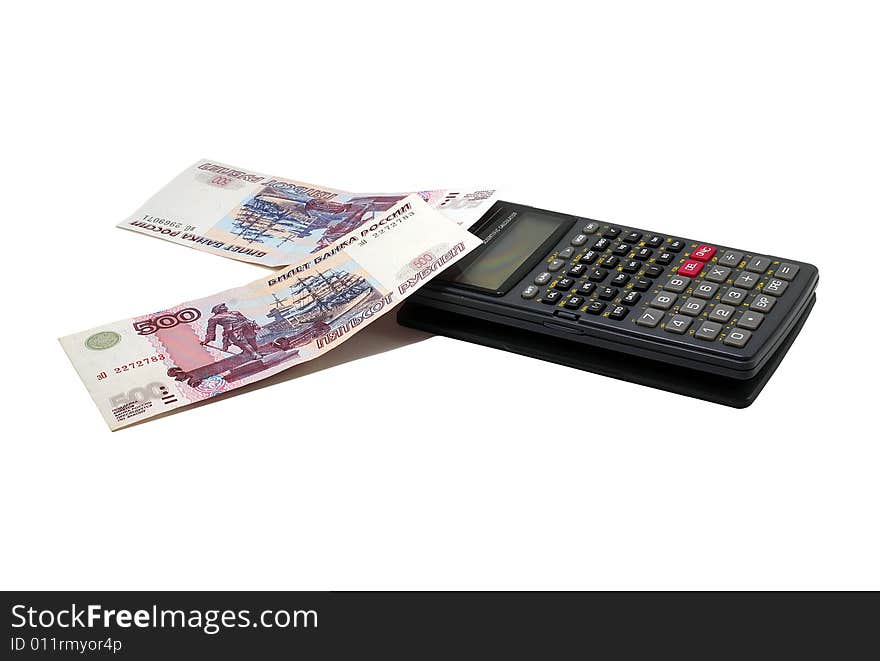 Money banknotes and calculator on a white background. Money banknotes and calculator on a white background