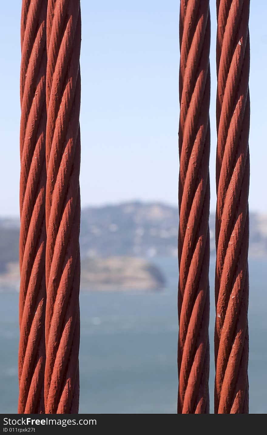 A close up macro shot of a suspension cable on the Golden Gate Bridge. A close up macro shot of a suspension cable on the Golden Gate Bridge.