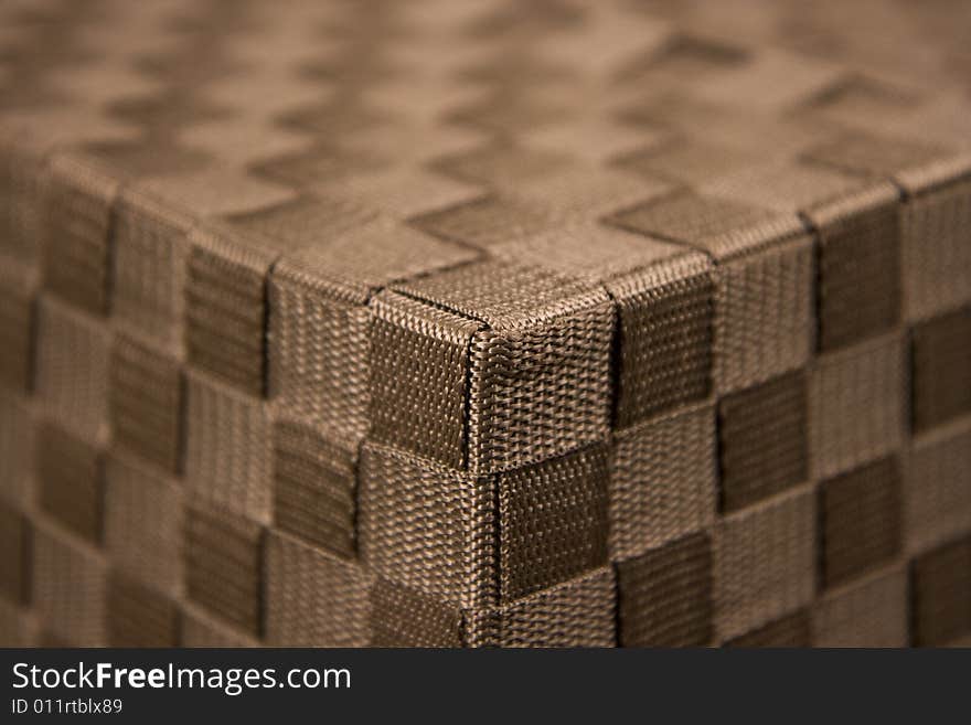 Closeup of basket corner, showing texture of nylon weave, fading into the background. Closeup of basket corner, showing texture of nylon weave, fading into the background.