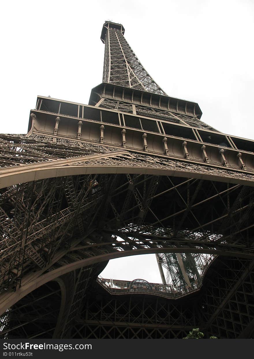 Angel of the eiffel tower, an iron tower built on the Champ de Mars beside the Seine River in Paris. The tower has become a global icon of France and is one of the most recognizable structures in the world.