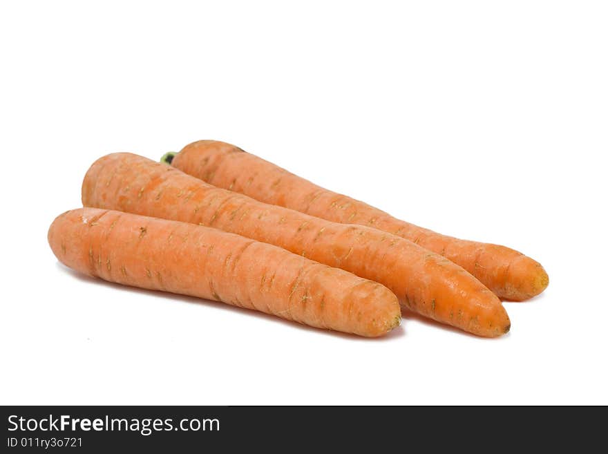 Three Carrots over the white. Three Carrots over the white