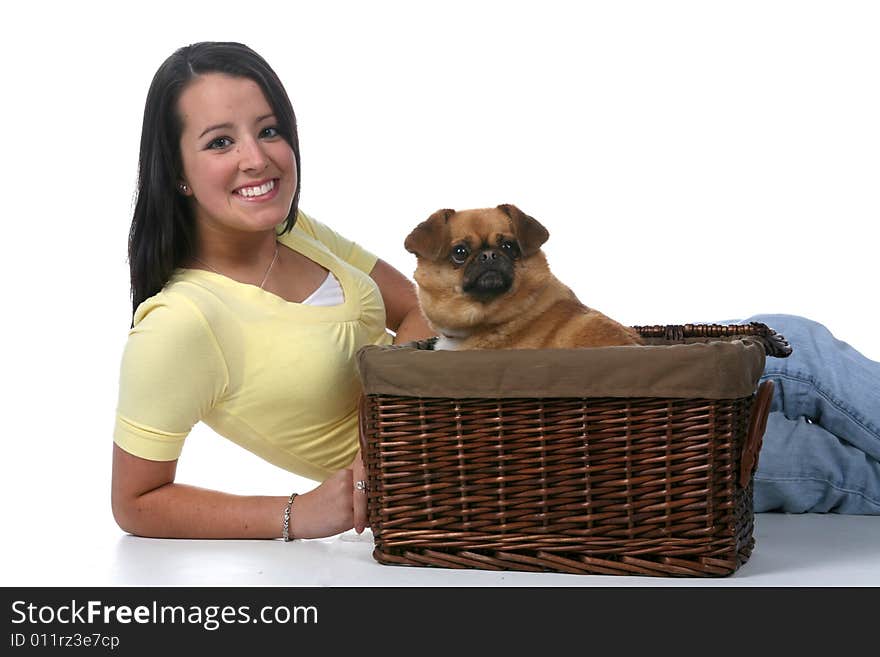 Cute teenage girl with small dog in basket. Cute teenage girl with small dog in basket