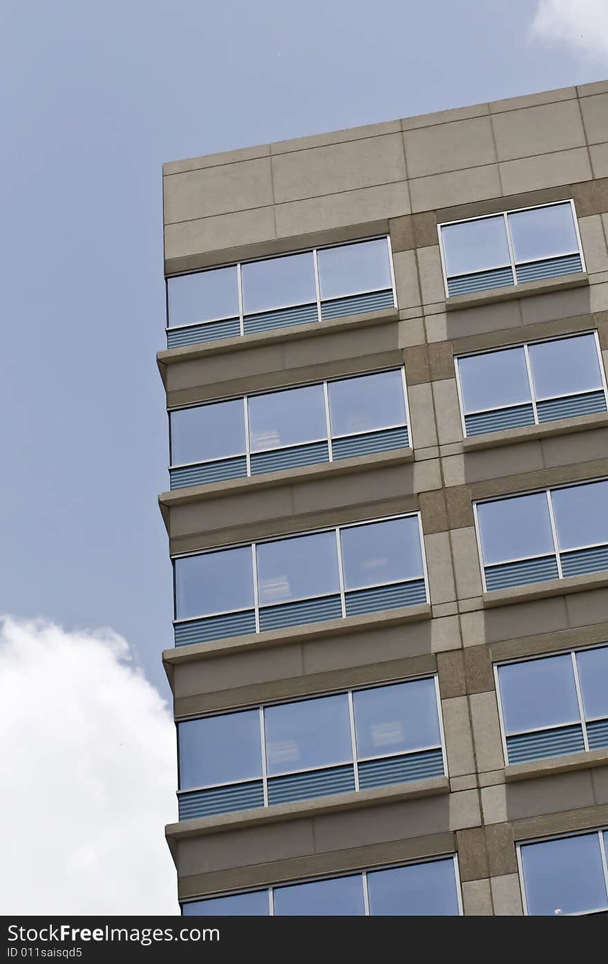 A modern building with the sky.