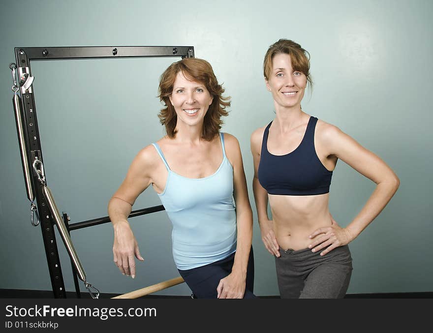 Portrait of Two Athletic Women in a Gym. Portrait of Two Athletic Women in a Gym