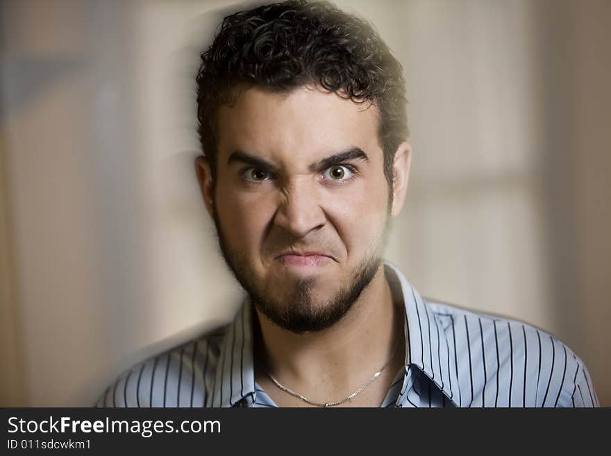 Close Up of Angry Young Man with a Photographic Motion Effect. Close Up of Angry Young Man with a Photographic Motion Effect