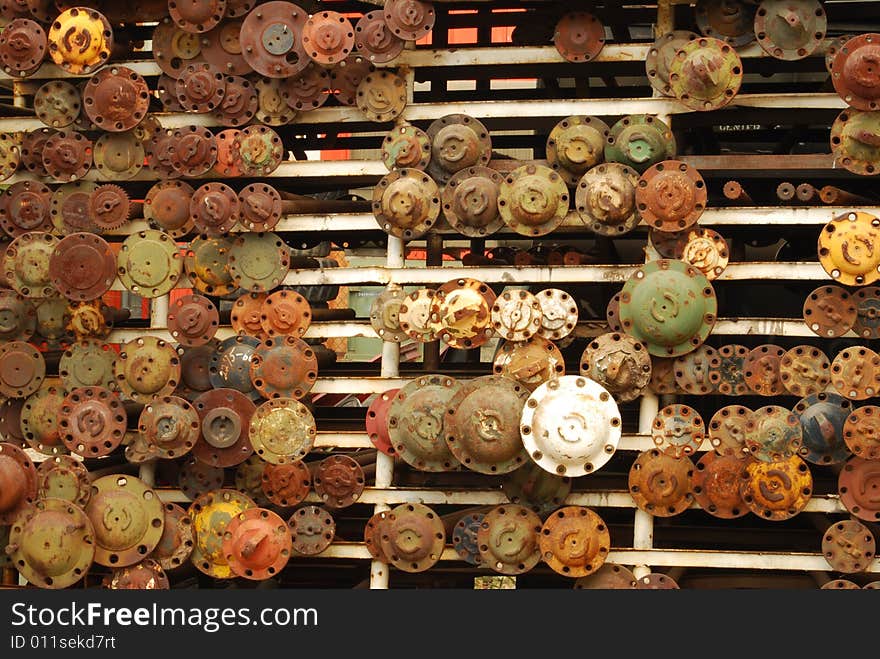 Colorful axle shafts on shelf