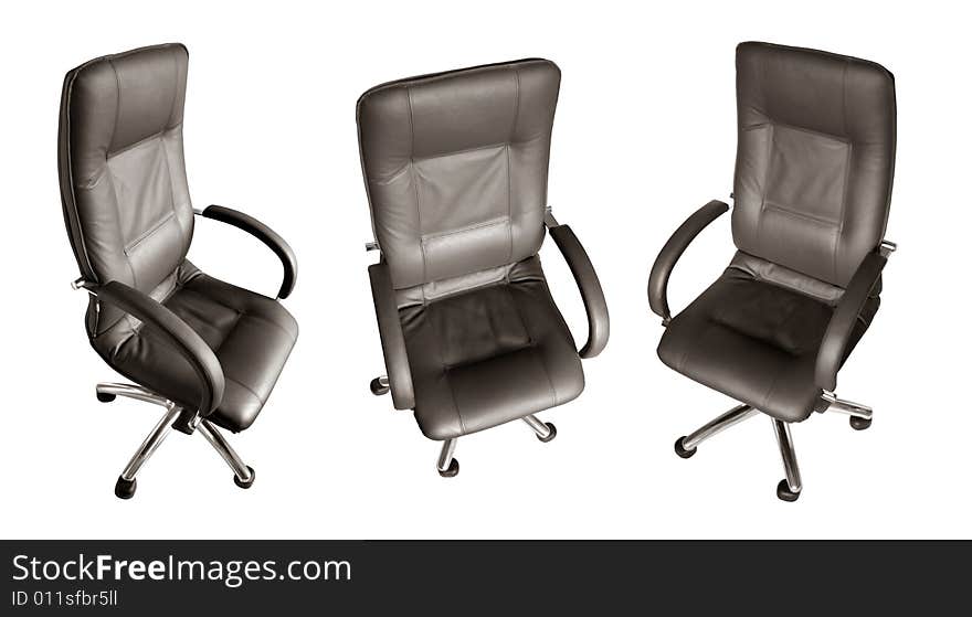 Some black leather armchairs in different foreshortenings are isolated