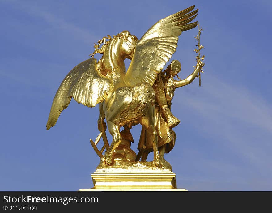 France; Paris; Bronze And Golden Leaf Statue