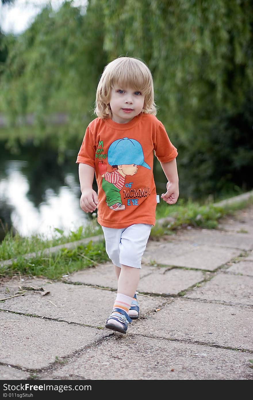 Little boy playing at the park. Little boy playing at the park