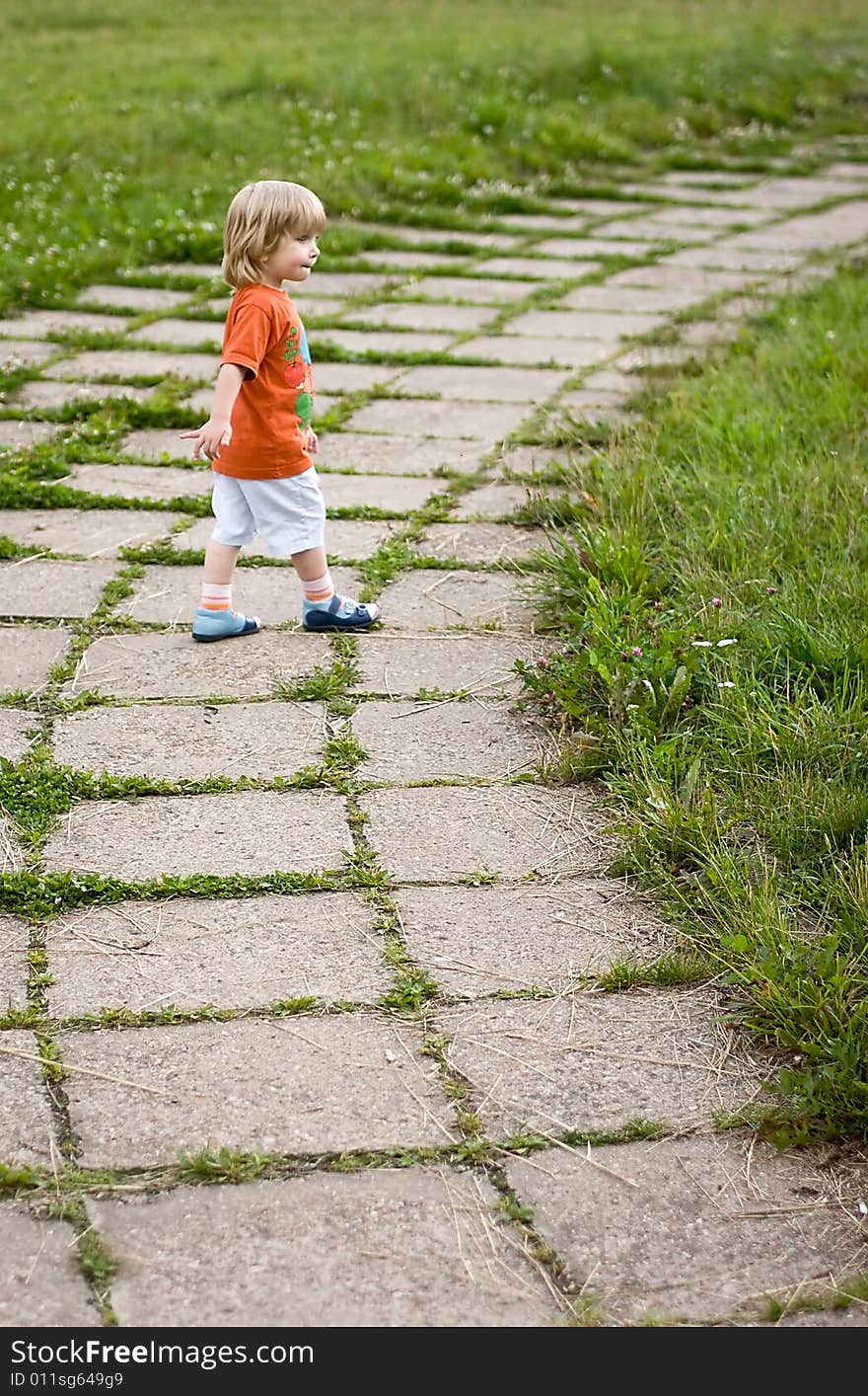 Little boy playing at the park. Little boy playing at the park